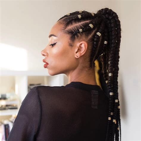 braided up into a ponytail|high ponytail with braiding hair.